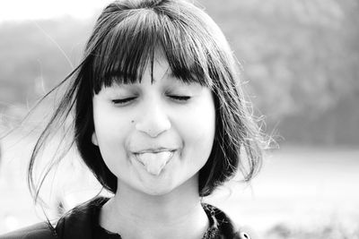 Close-up portrait of smiling girl