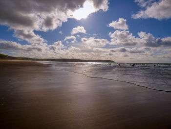 Scenic view of beach against sky