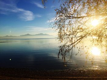 Scenic view of sunset over lake