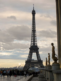 Low angle view of monument against cloudy sky