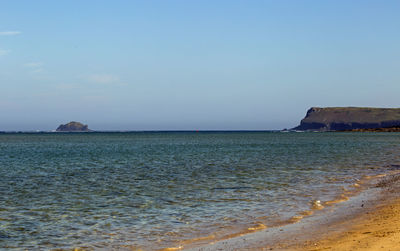 Scenic view of sea against clear sky