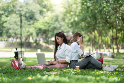 Woman sitting in park