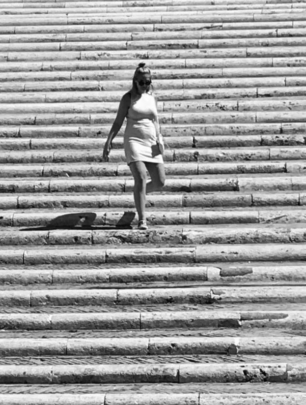 FULL LENGTH OF MAN STANDING BY STEPS