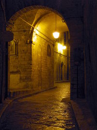 Illuminated corridor at night