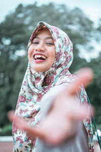 Portrait of a smiling young woman