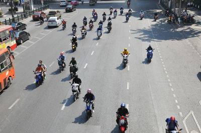 High angle view of people crossing road