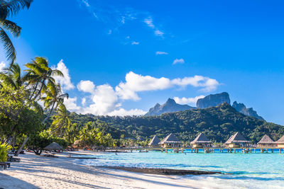 Scenic view of sea against blue sky