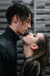 Couple taking shower in bathroom