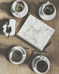 High angle view of coffee cup on table