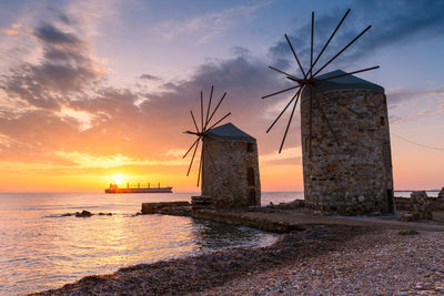 Sunrise image of the iconic windmills in chios town.