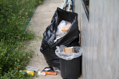 Garbage bin in field
