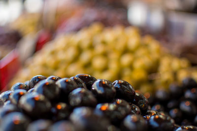 Close-up of olives for sale in market