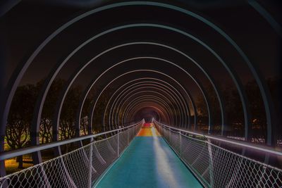 Empty footbridge in tunnel