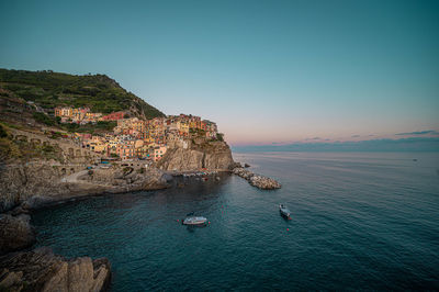 Manarola city of cinqe terre while sunset