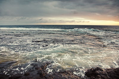 Scenic view of sea against sky during sunset