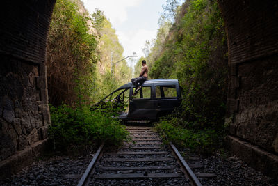 Man on abandoned rails 