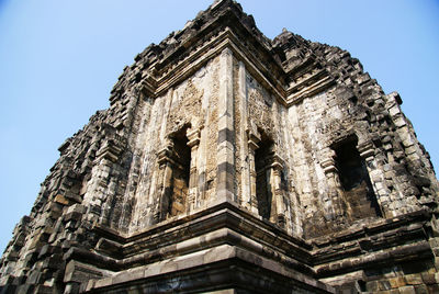 Low angle view of old building against clear sky