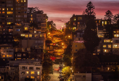 High angle view of illuminated buildings at night