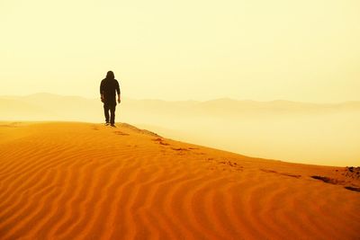 Scenic view of desert against clear sky