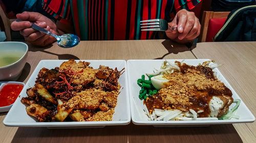 High angle view of food served on table