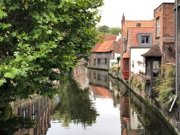 Canal amidst buildings in town