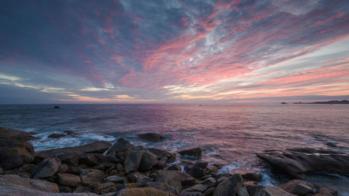 Scenic view of sea against sky during sunset