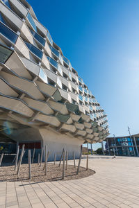 Low angle view of building against blue sky