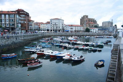 High angle view of boats moored in pond