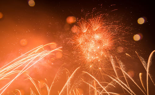 Firework display at night