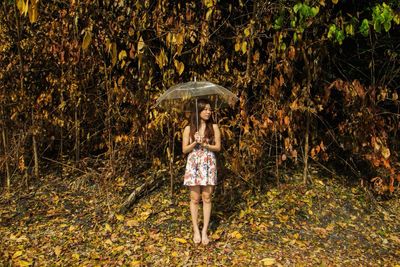 Woman standing on field