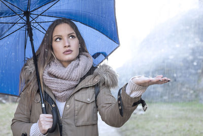 Portrait of woman with umbrella