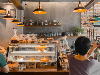 Rear view of people at restaurant