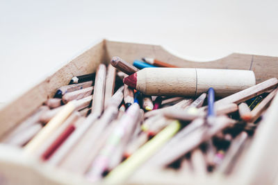 Close-up of multi colored pencils in box