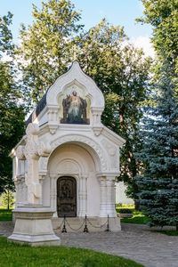 Church by building against trees