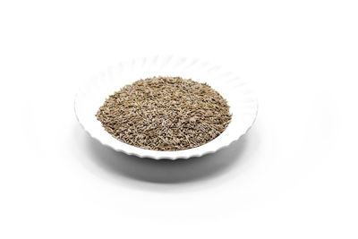 High angle view of bread in bowl against white background