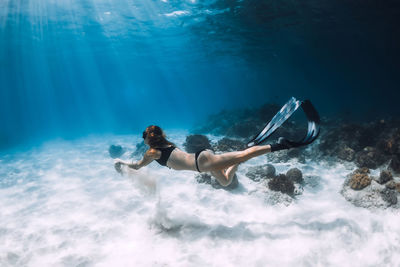 Man swimming in sea