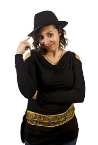 Low angle view of woman standing against white background