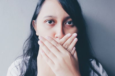 Close-up portrait of young woman