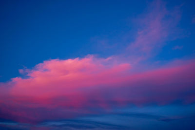 Low angle view of dramatic sky during sunset