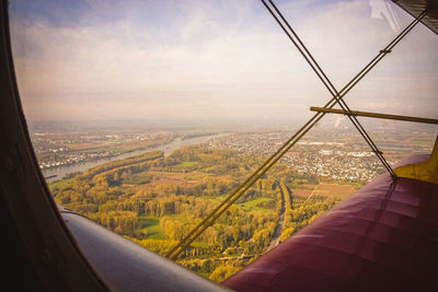 Aerial view of cityscape seen through window