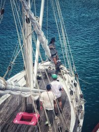 High angle view of sailboat sailing in sea