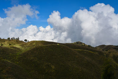 The view from the top of mount prau and the activities of the climbers near the camping tent