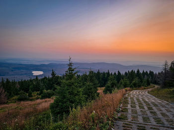 Scenic view of landscape against sky during sunset