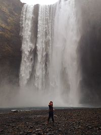 Woman standing in water