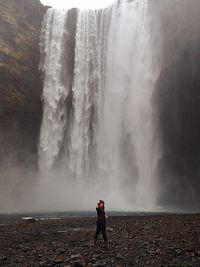 Woman standing in water