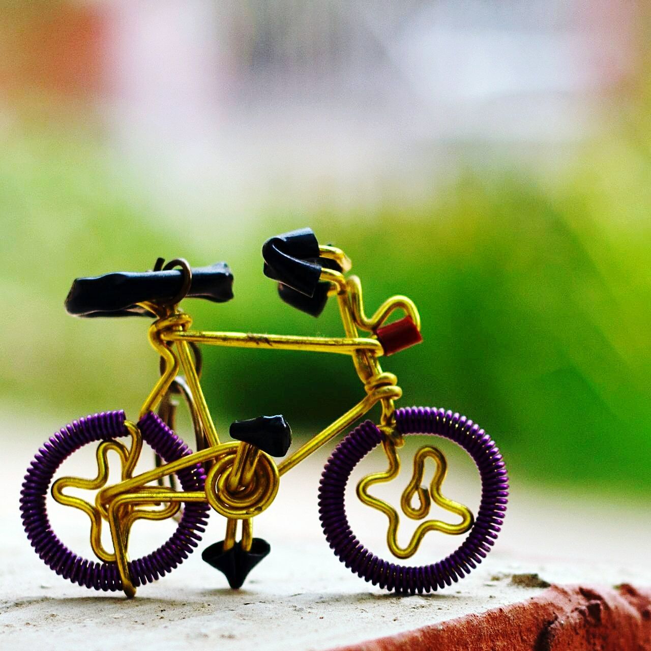 focus on foreground, metal, close-up, metallic, rusty, selective focus, equipment, still life, security, old, bicycle, day, no people, outdoors, protection, old-fashioned, safety, communication, chain, technology