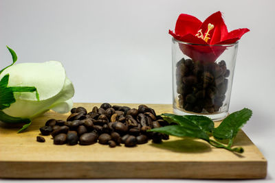 Close-up of red roses on table