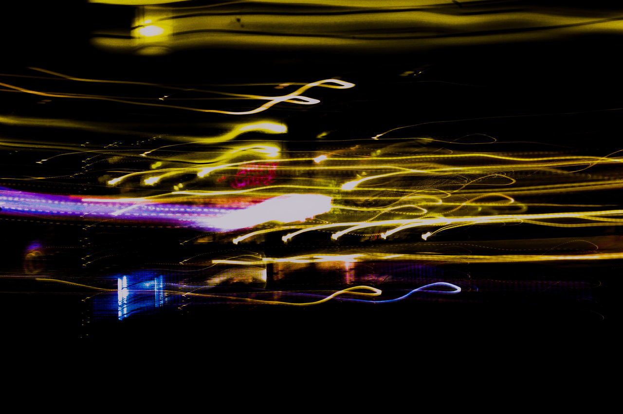 multi colored, illuminated, motion, long exposure, light trail, blurred motion, night, speed, abstract, glowing, no people, water, light - natural phenomenon, yellow, indoors, pattern, light painting, arts culture and entertainment, creativity, complexity