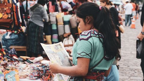 Women standing in market