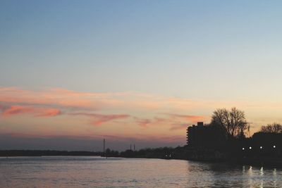 Scenic view of silhouette trees against sky during sunset